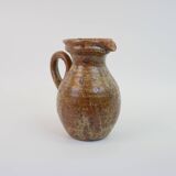 Brown speckled stoneware pitcher in very good condition