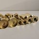 A set of six brass candle holder in mid-century modern design - Denmark 1970s.