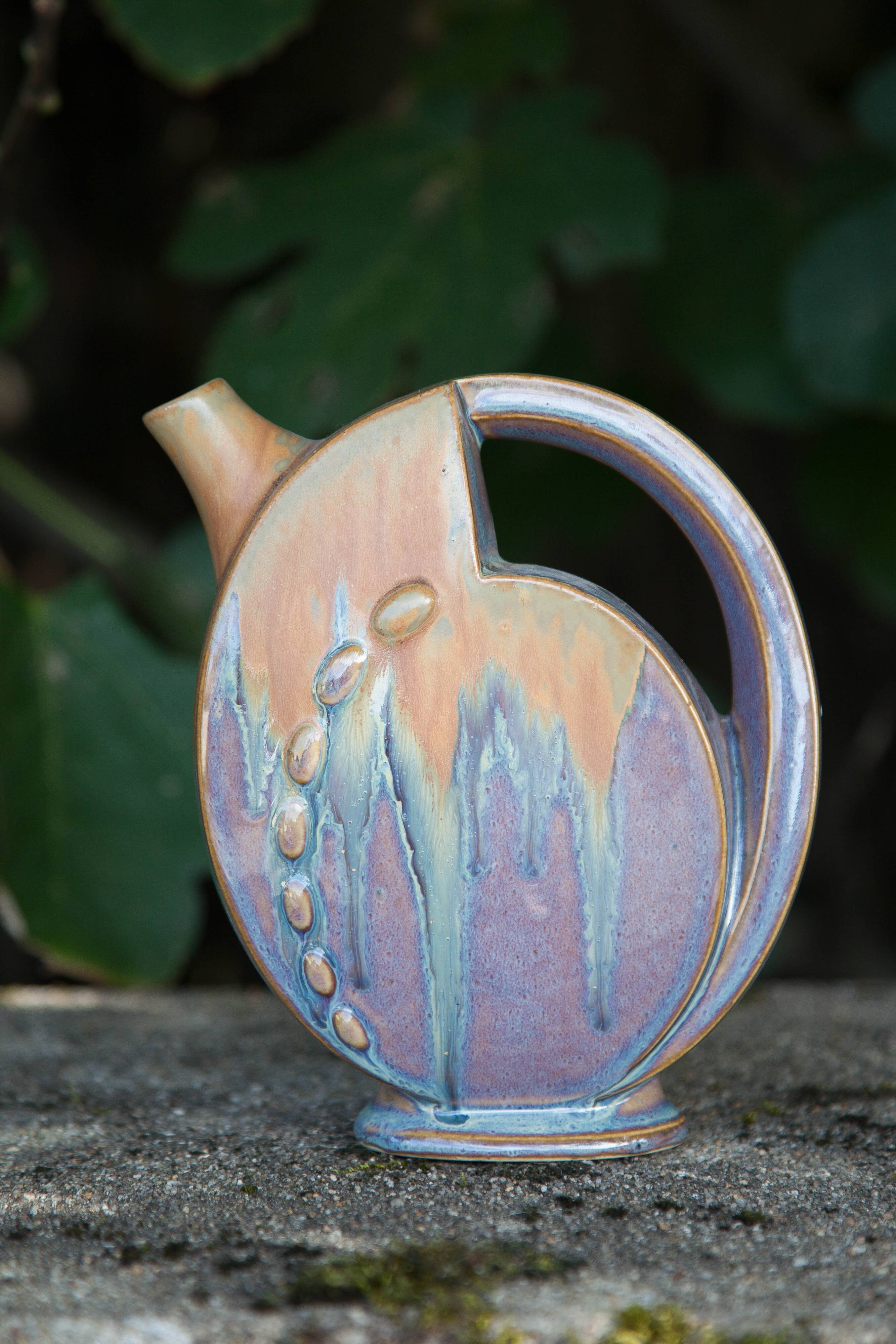 Flamed enameled stoneware bottle, pitcher, liquor bottle signed Denbac number 610, art vase