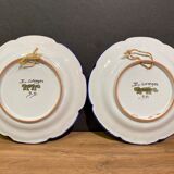 Pair of Nevers earthenware plates signed Georges