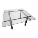 Designer table in glass and metal