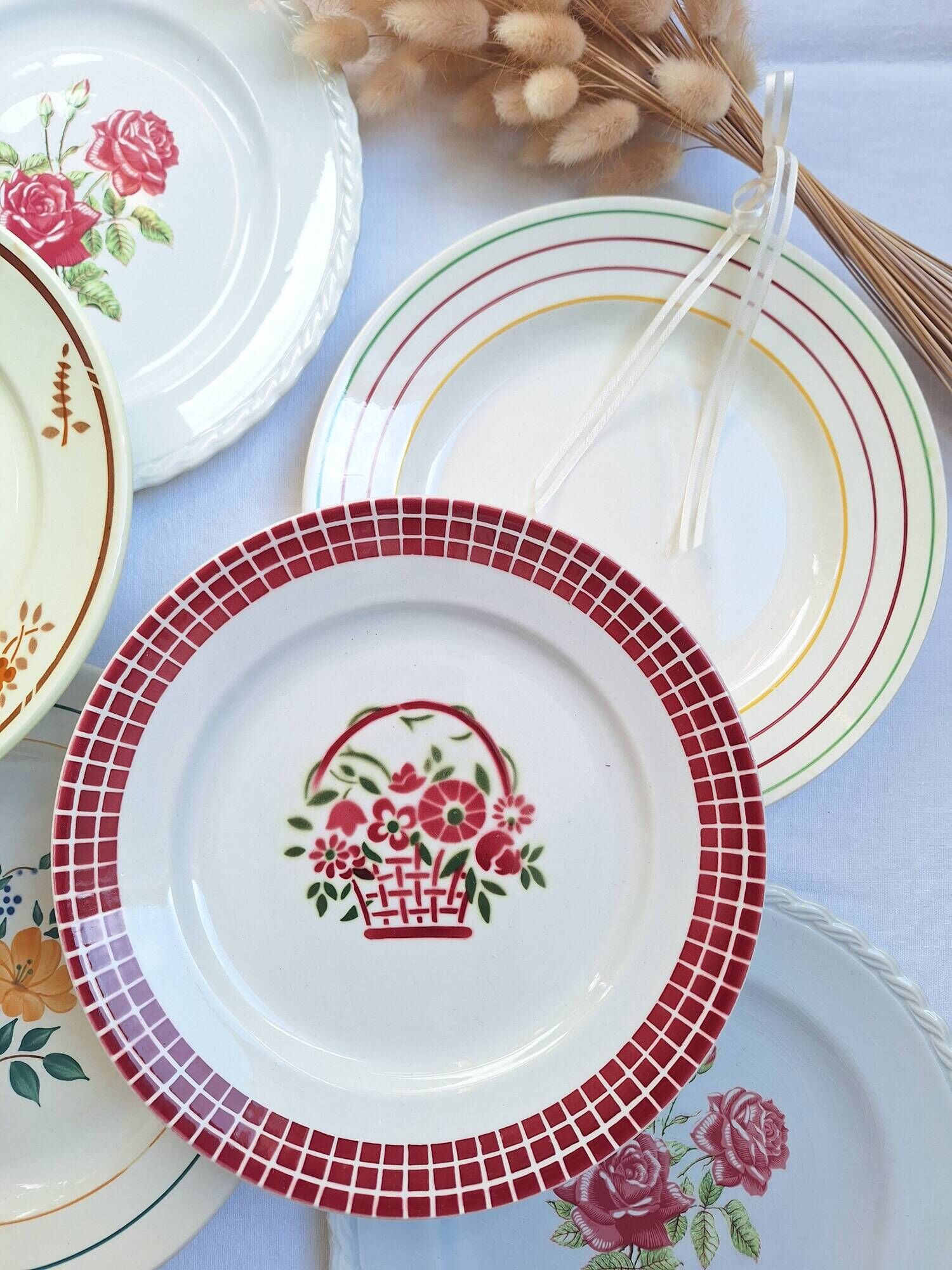 Multicolored flower dinner plates from Moulin des Loups, St Amand and Badonville