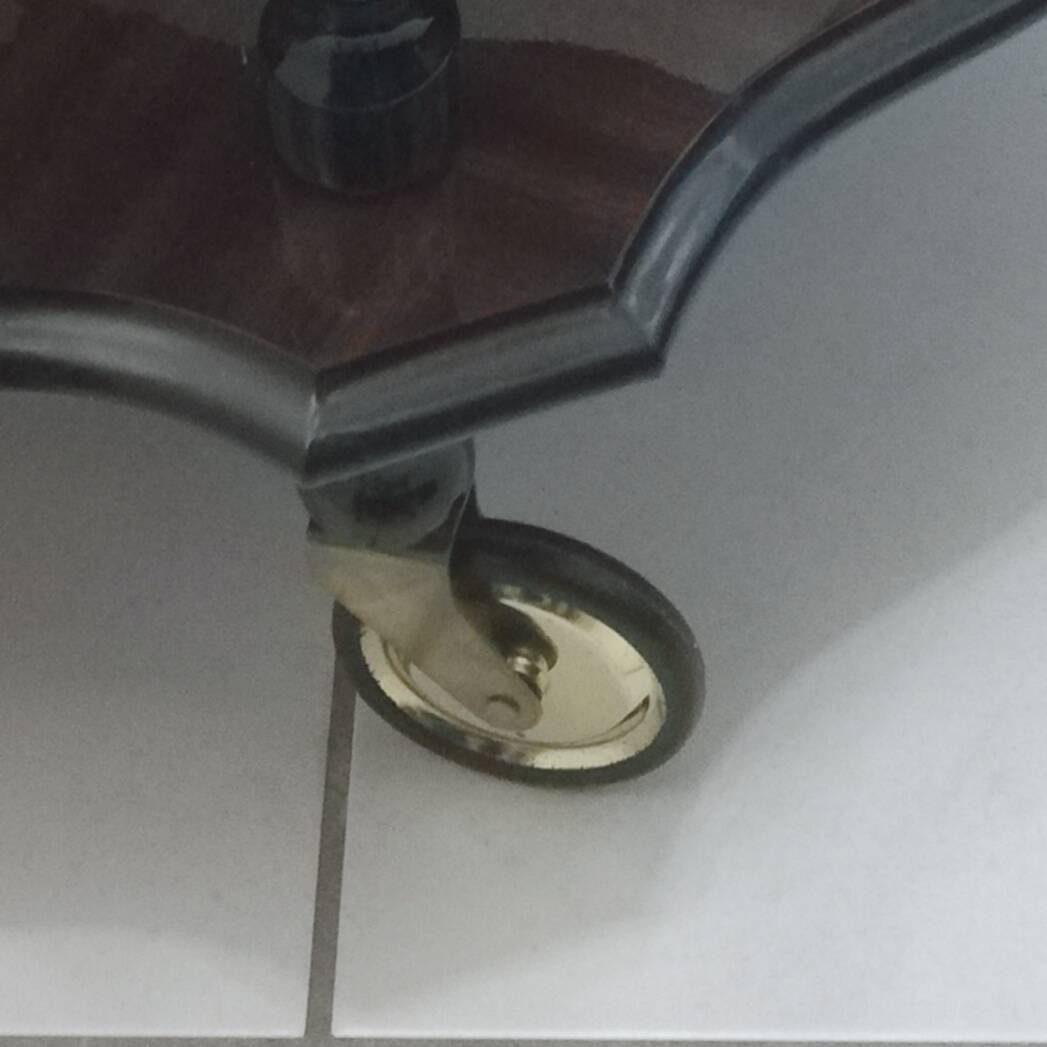 Marquetry trolley on wheels