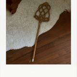 Braided wicker carpet beater