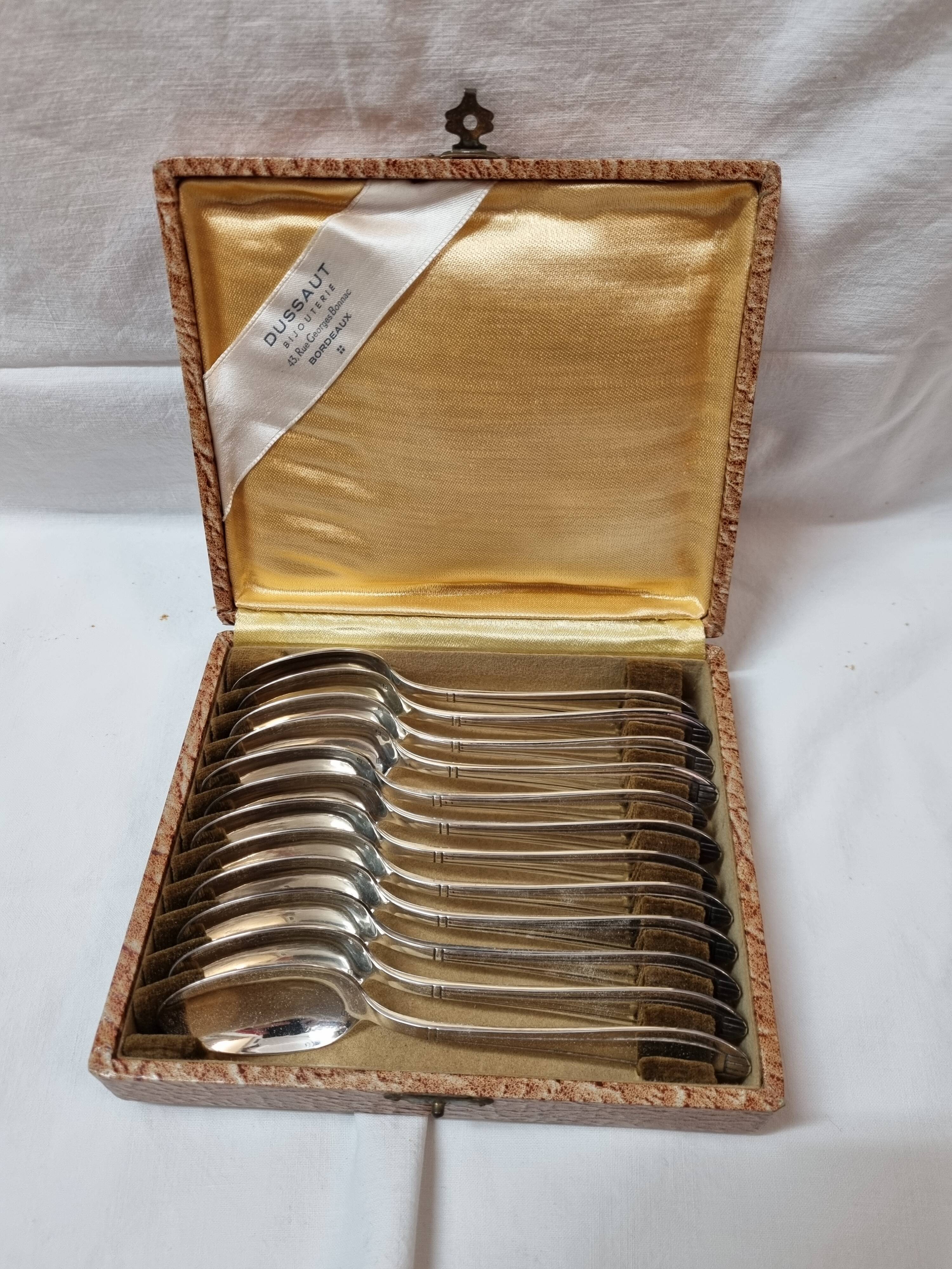12 teaspoons silver art deco