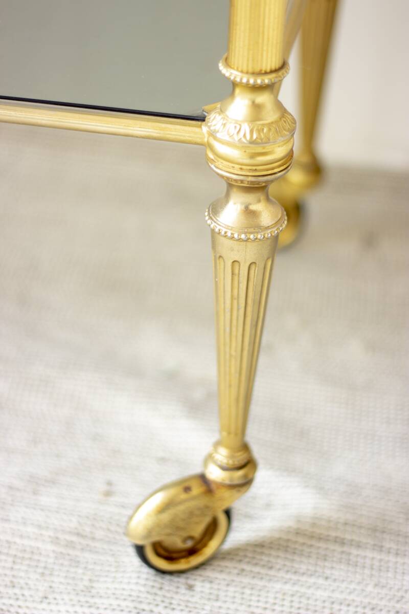 Gold metal and smoked glass server