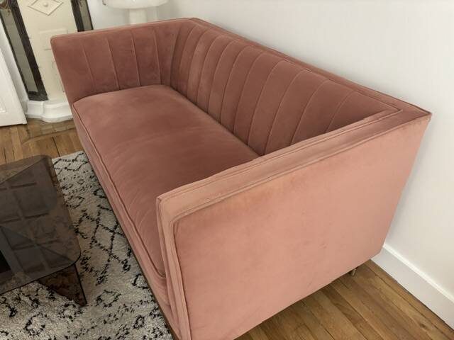 Compact powder pink sofa made
