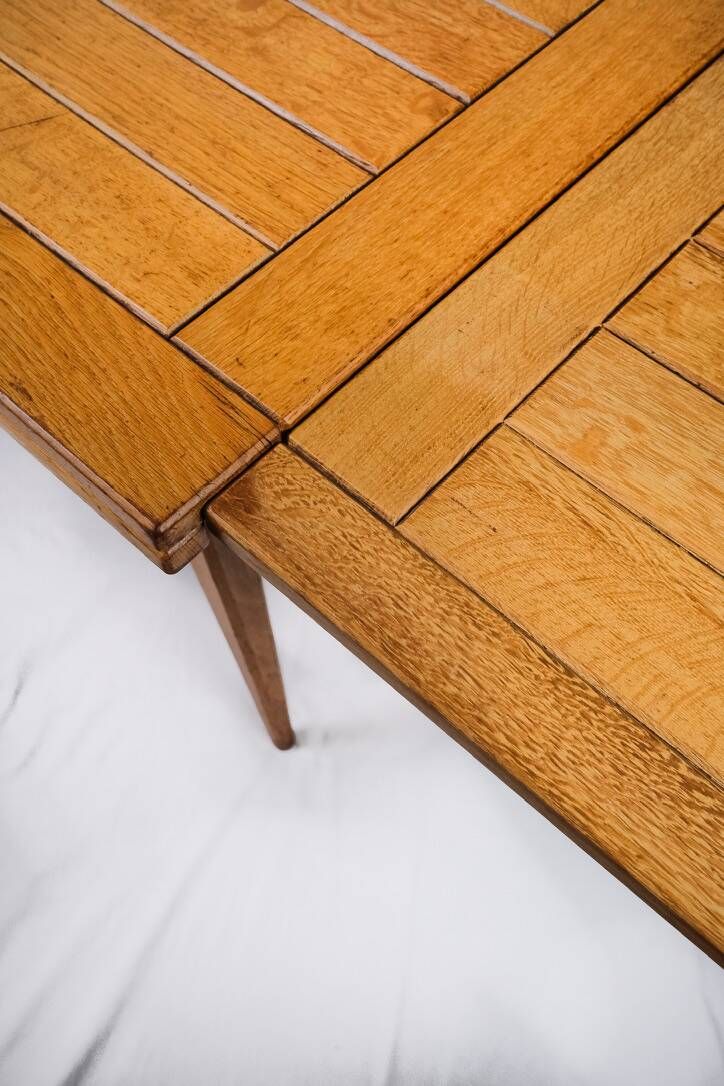 Extendable oak table in the style of Guillerme and Chambron, France 1960s