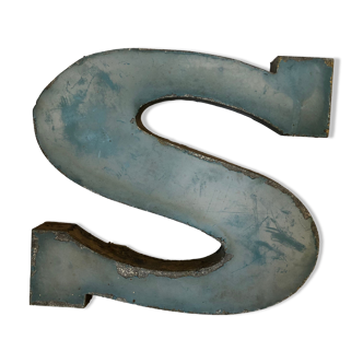 Blue sign letter "S"