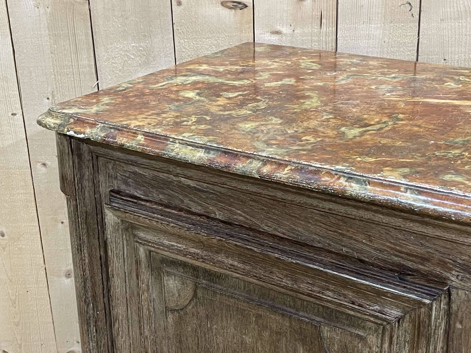 18th-century oak enfilade with a marble-effect painted top.