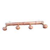Old wooden coat hook imitating bamboo.
