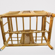 Wicker rattan magazine rack with vintage caning
