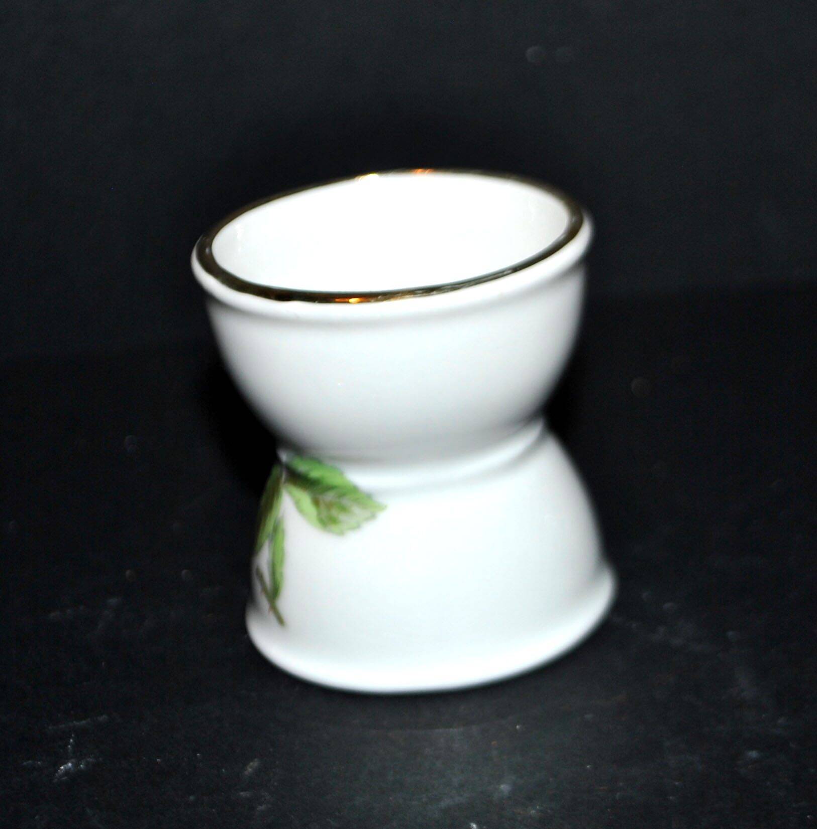 Vintage Paris porcelain egg cup with yellow flower decor