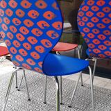 Blue and terracotta ant chairs with eye pattern