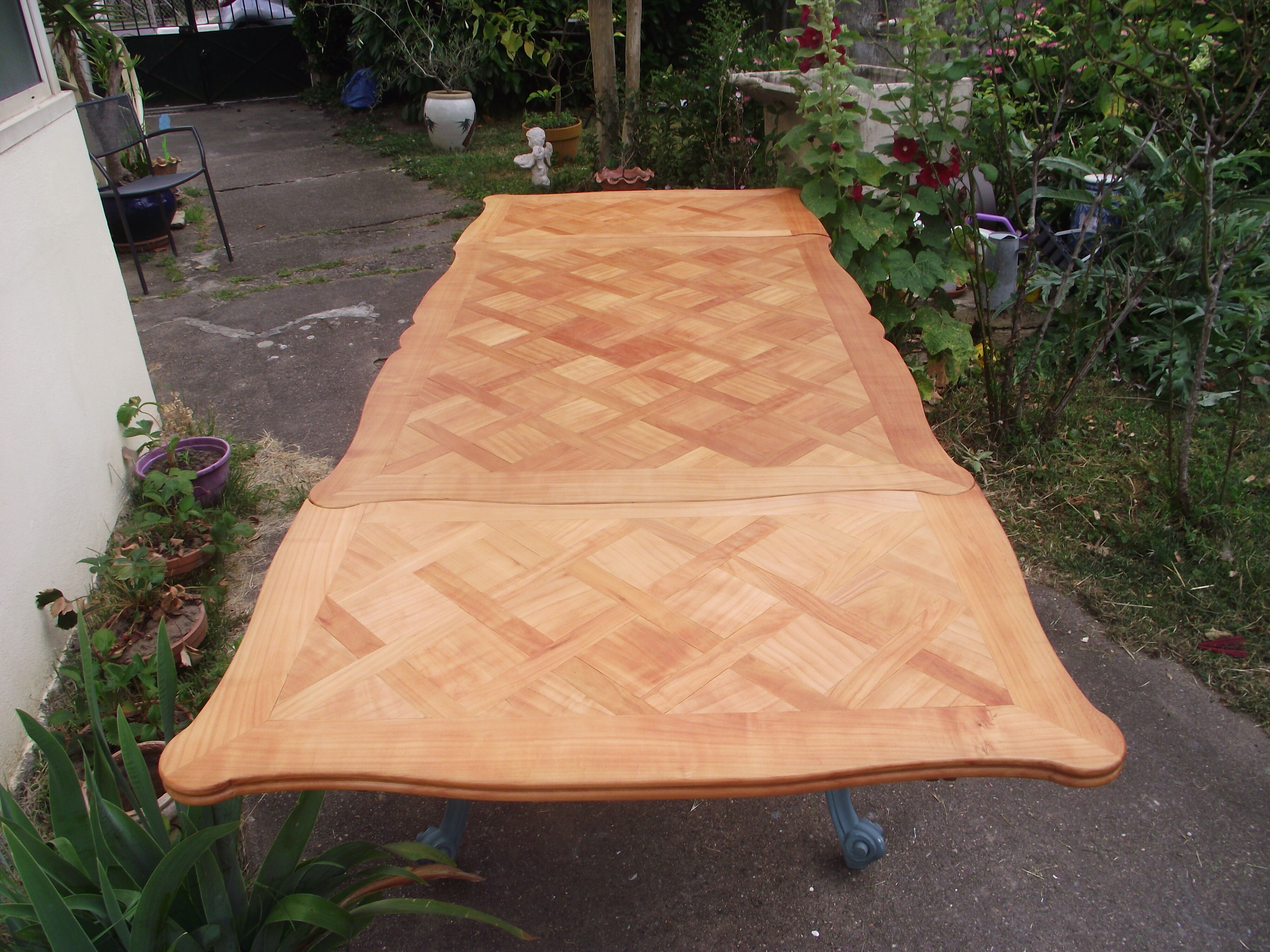 Louis XV-style extension table in solid cherry.