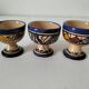 Trio of Moroccan ceramic egg cups from Fez, stamped