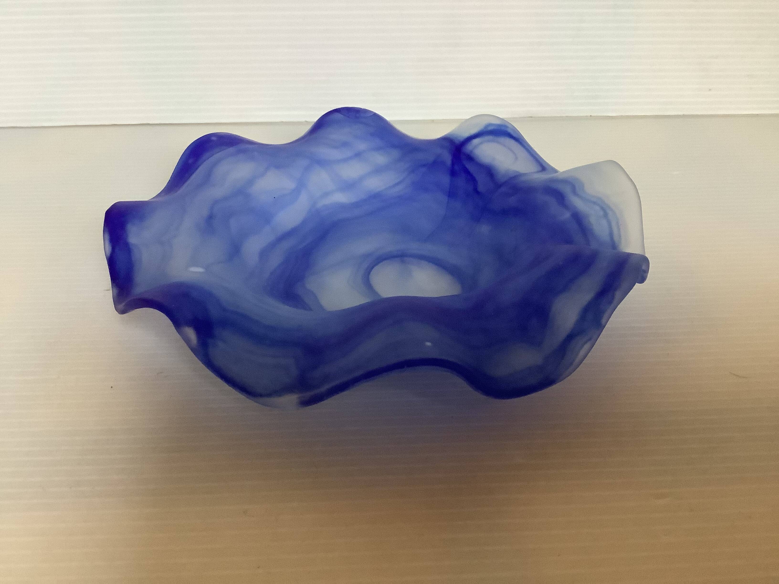 Cobalt blue glass ring with a scalloped edge