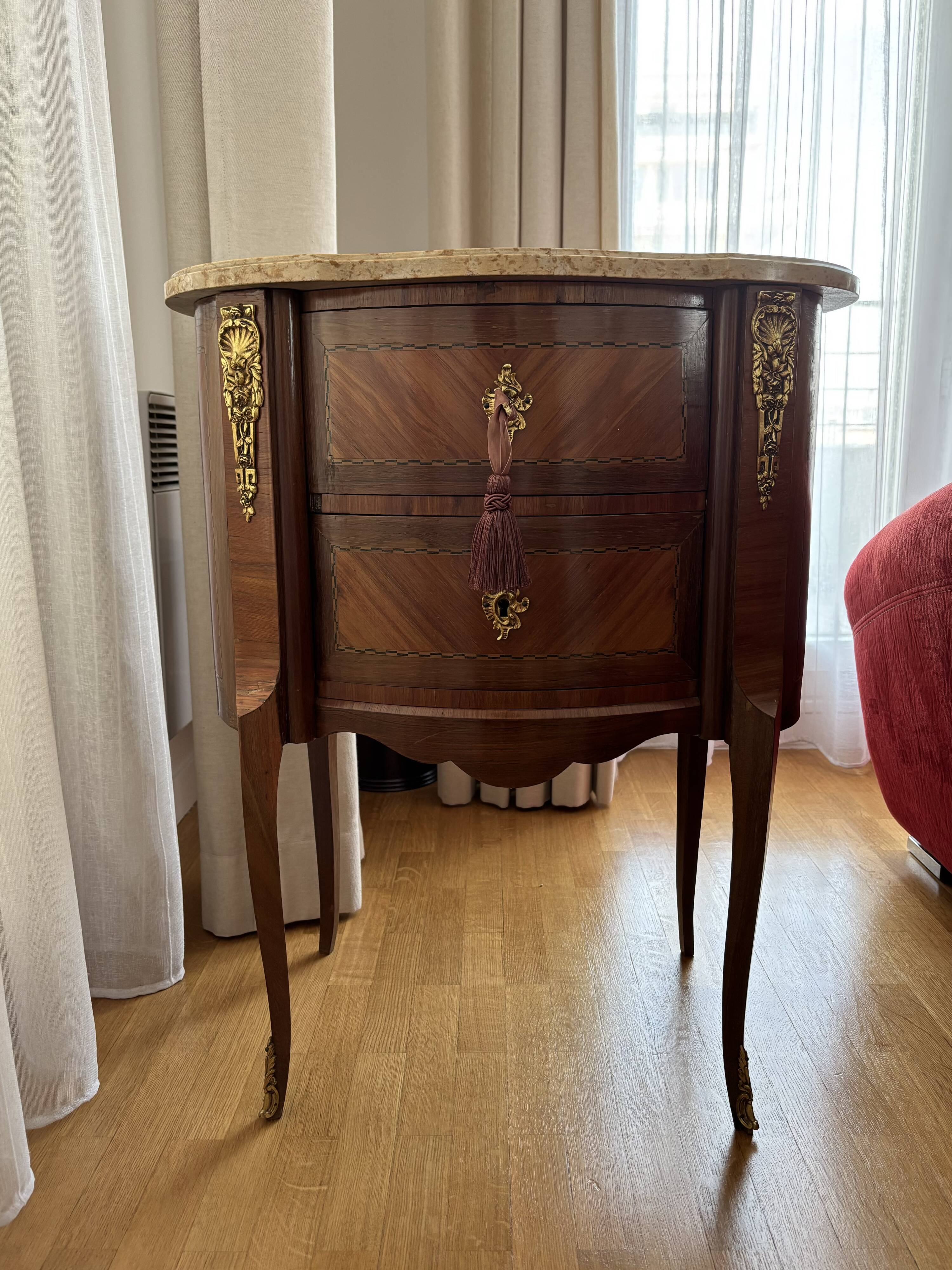 Louis XV chest of drawers in marquetry and gilded bronze, marble top