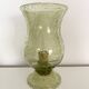 Important green bubbled glass candlestick