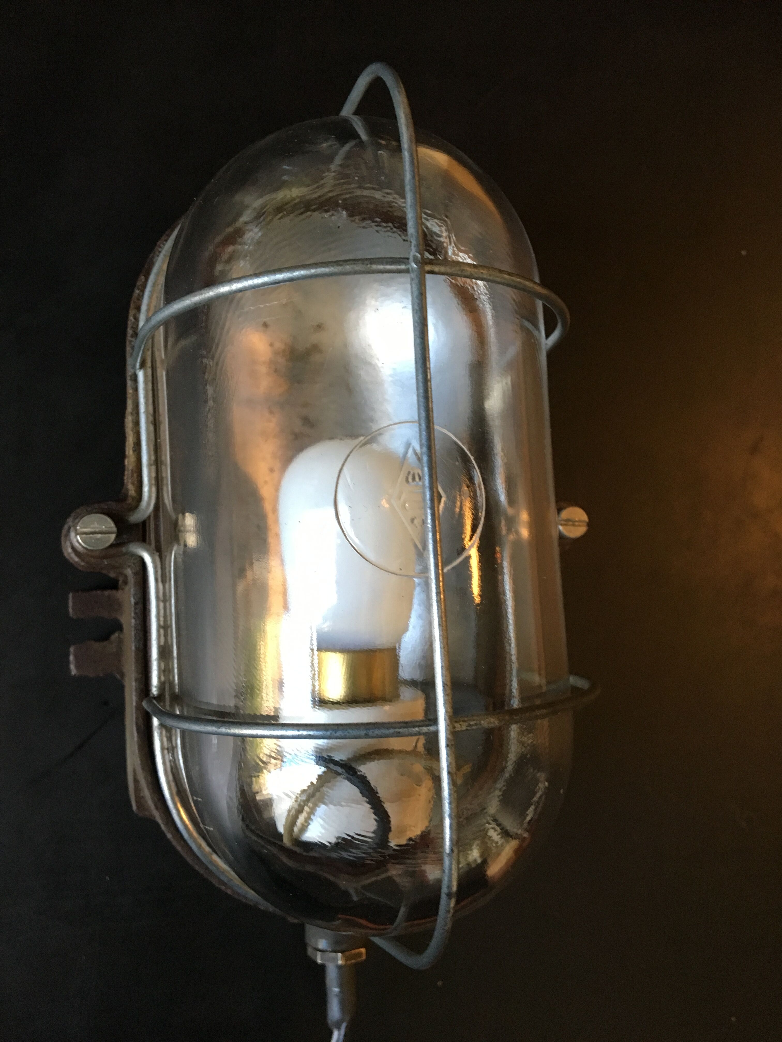 Industrial porthole wall lamp from the 1950s
