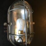 Industrial porthole wall lamp from the 1950s