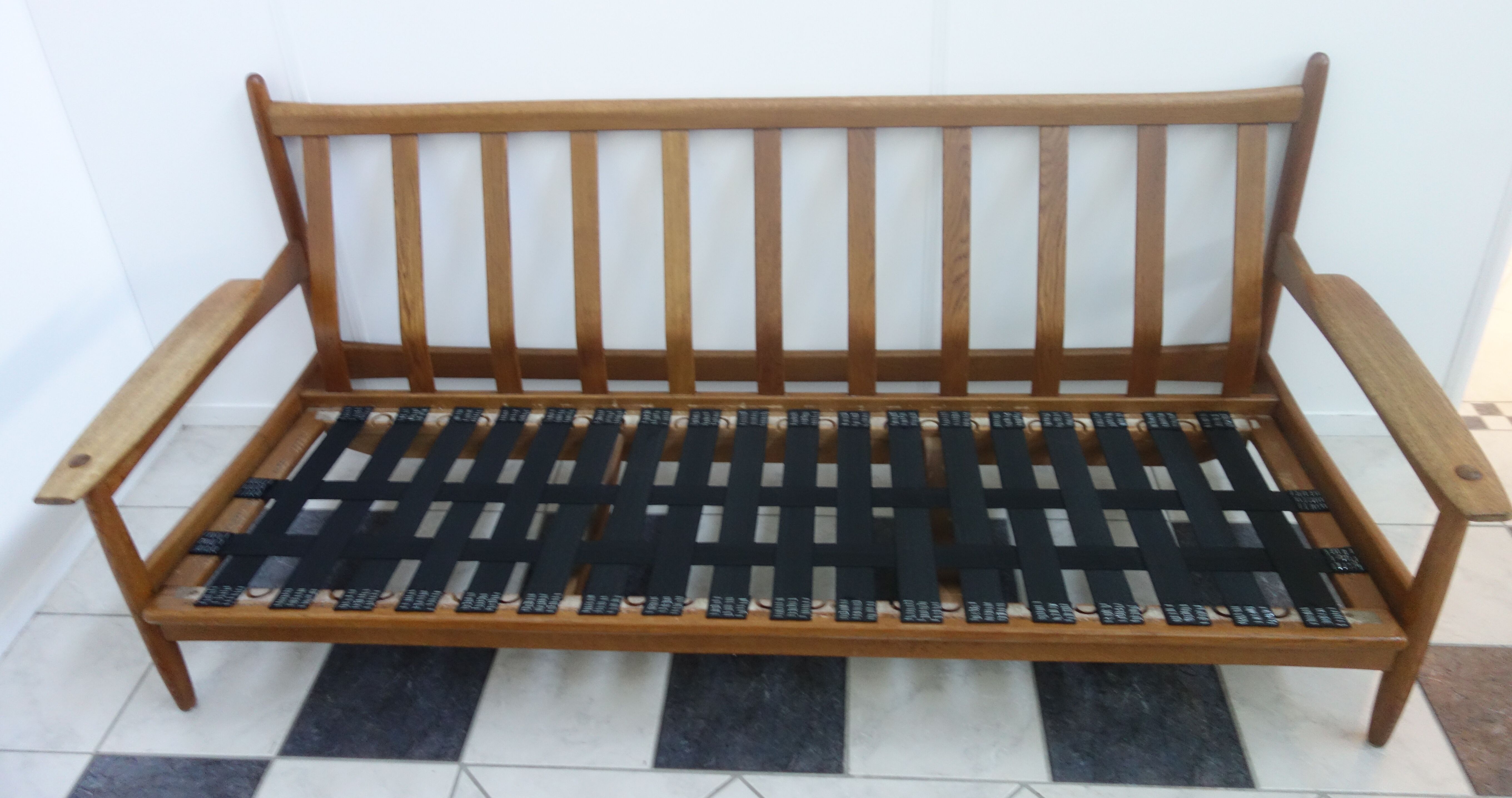 Three seater sofa in fabric and wood