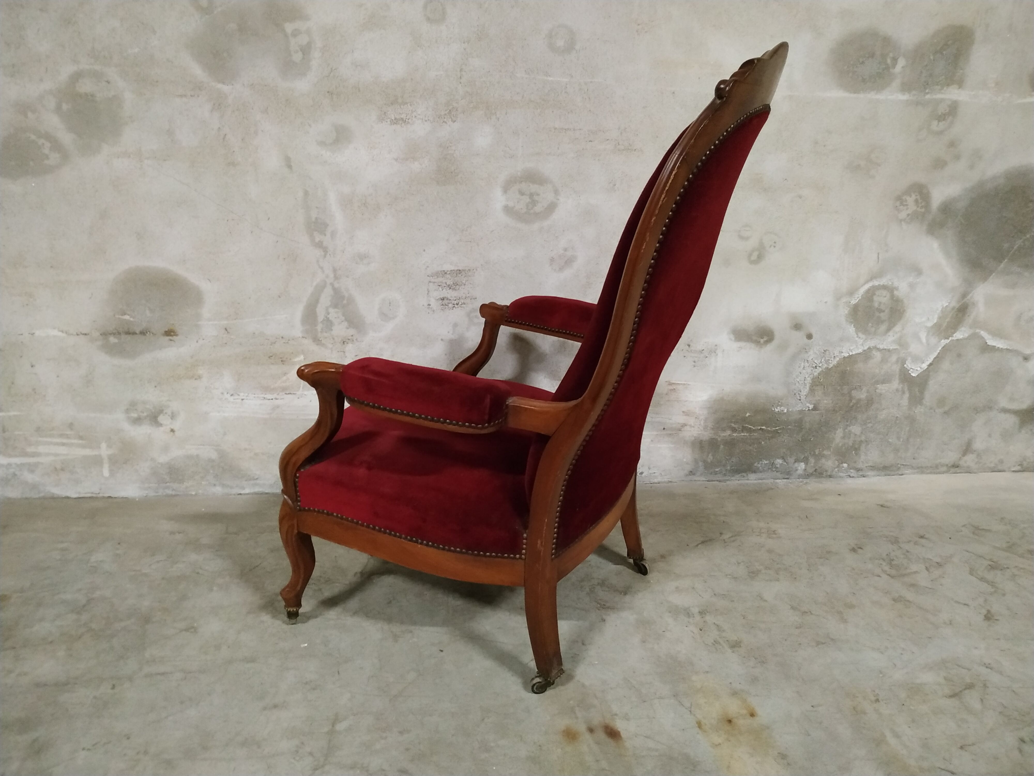 Walnut and velvet armchair