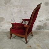 Walnut and velvet armchair