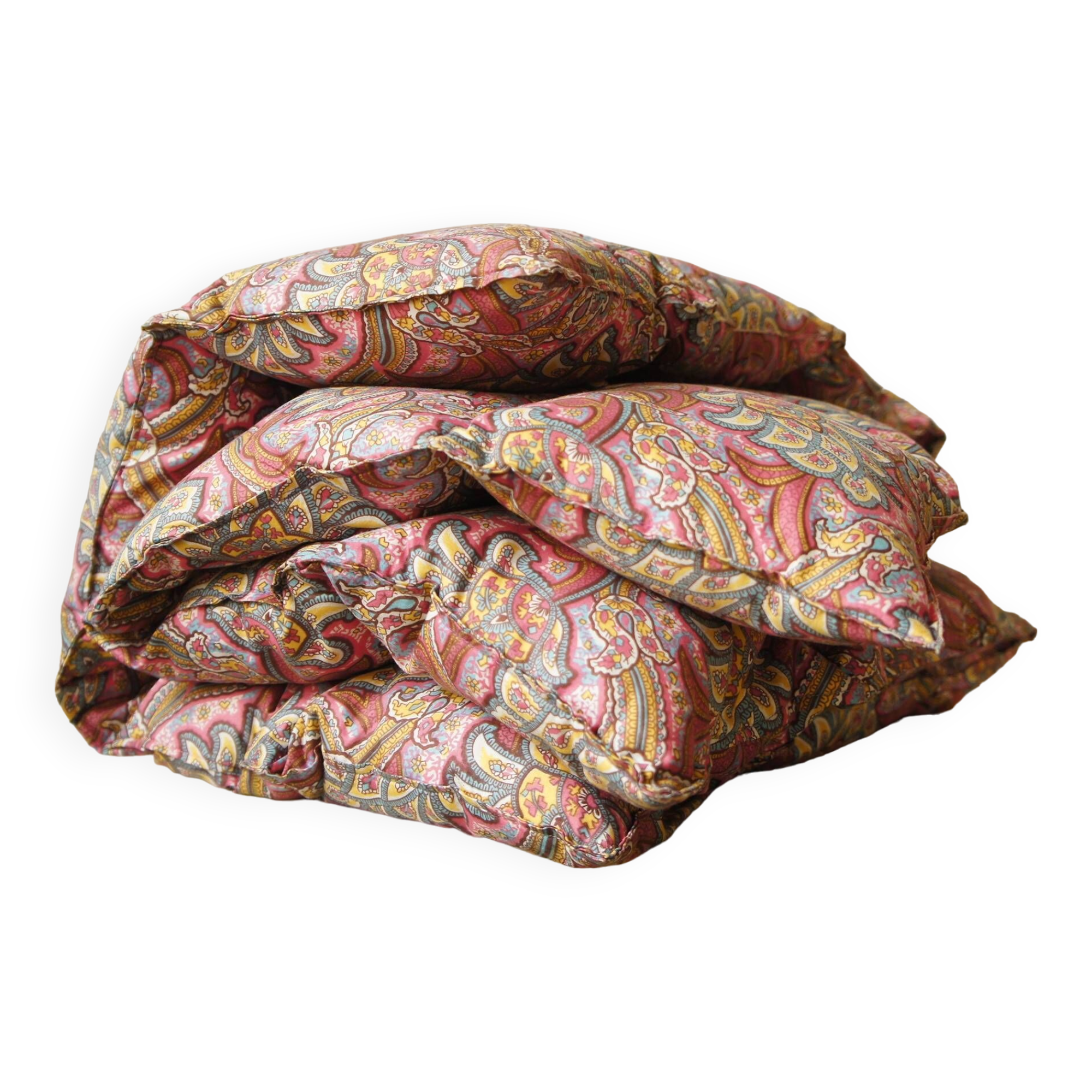 Small quilt filled with paisley pattern feathers