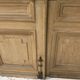 Pair of Haussmann-style double passage doors in patinated oak from the 19th century.