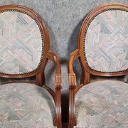 Paire de fauteuils style louis XVI a dossiers médaillons époque XXème