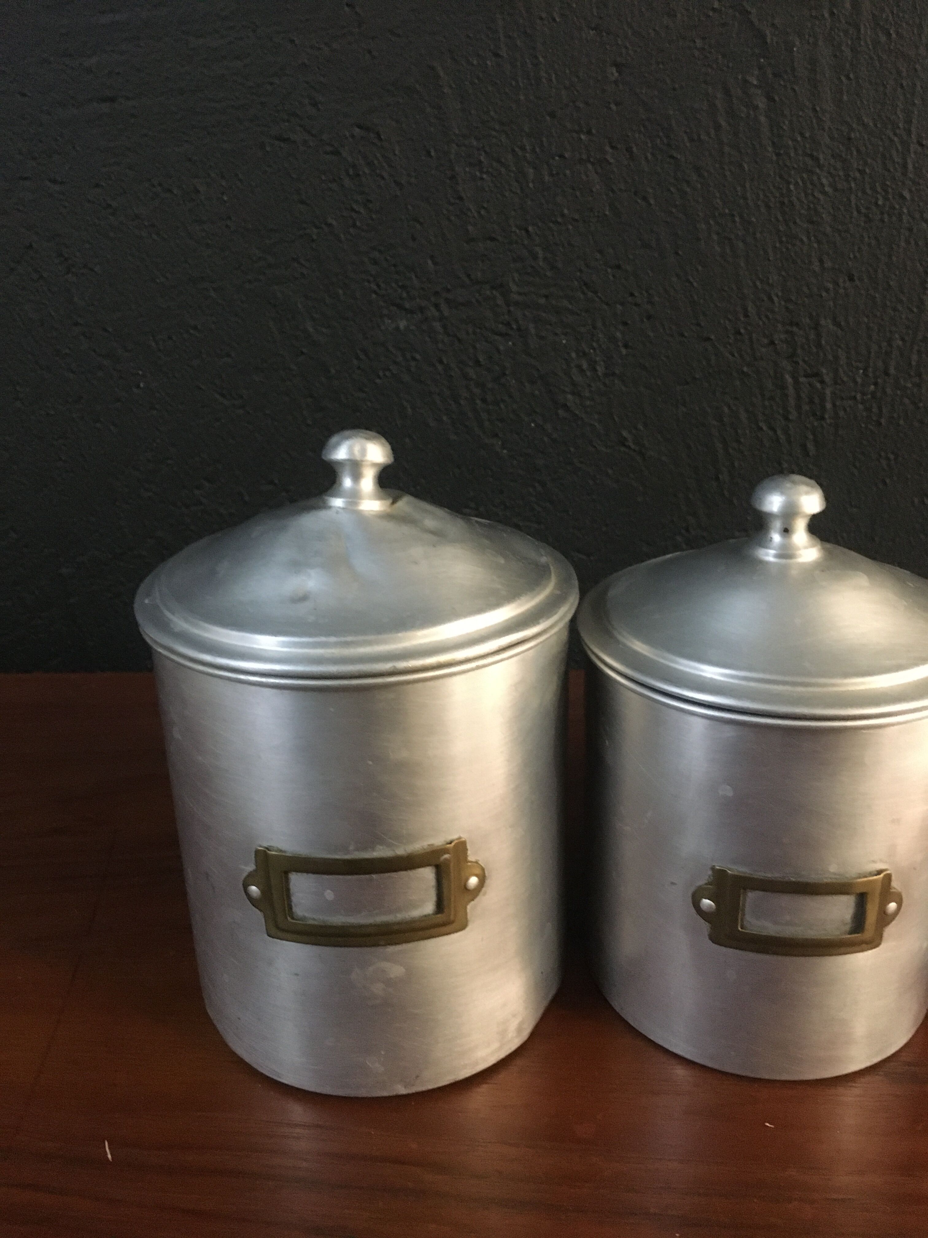 Six aluminum spice pots