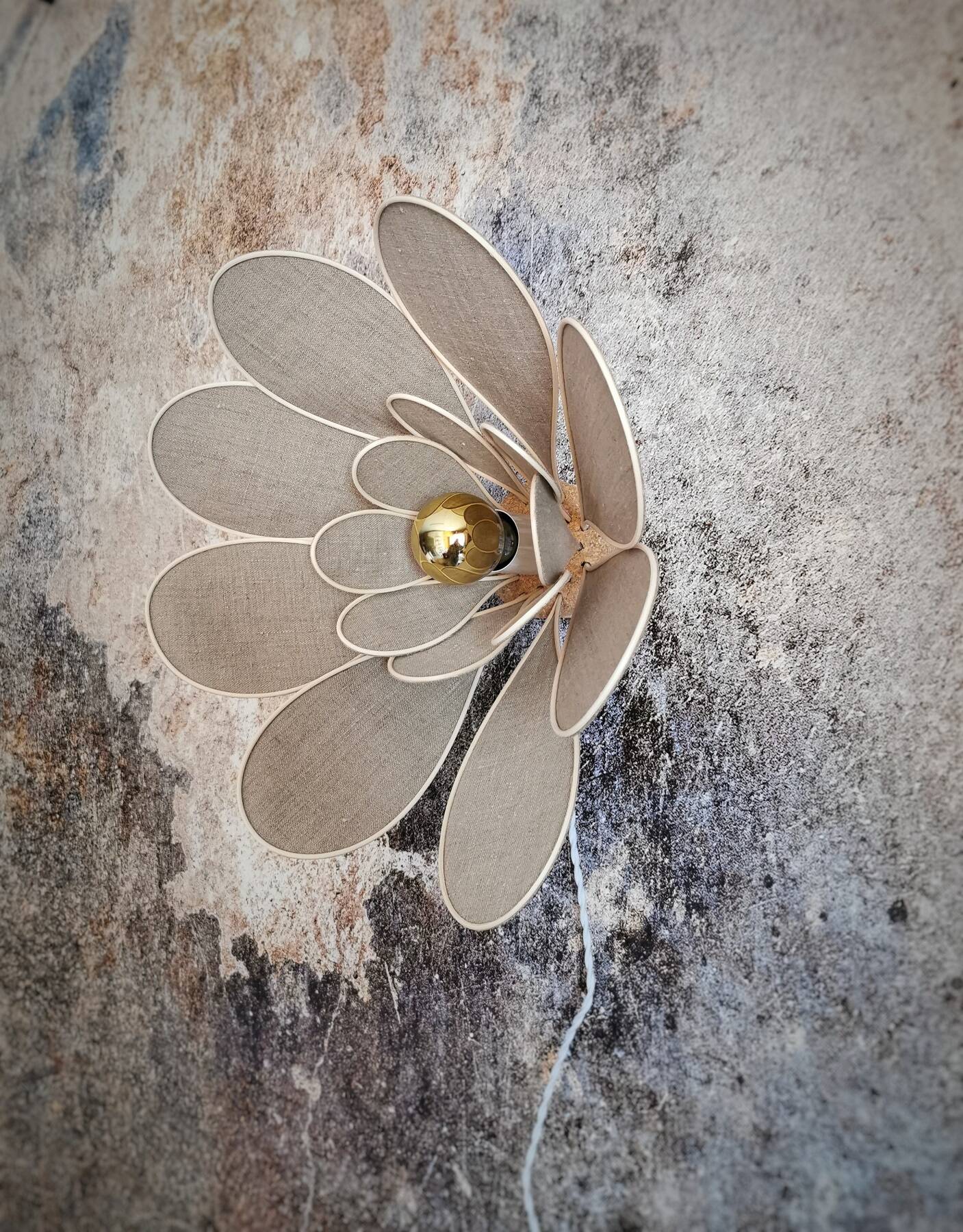 Flower wall light made of rattan and natural linen petals