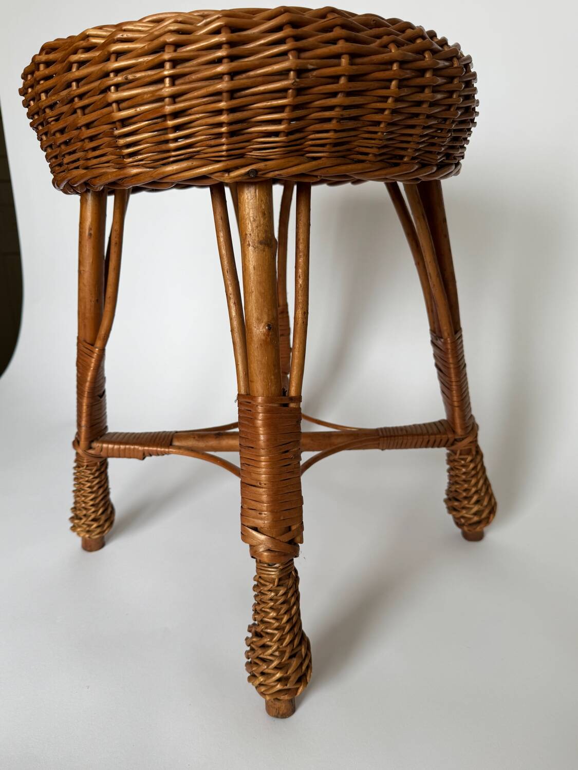 Vintage Mid Century Modern handwoven wicker stool