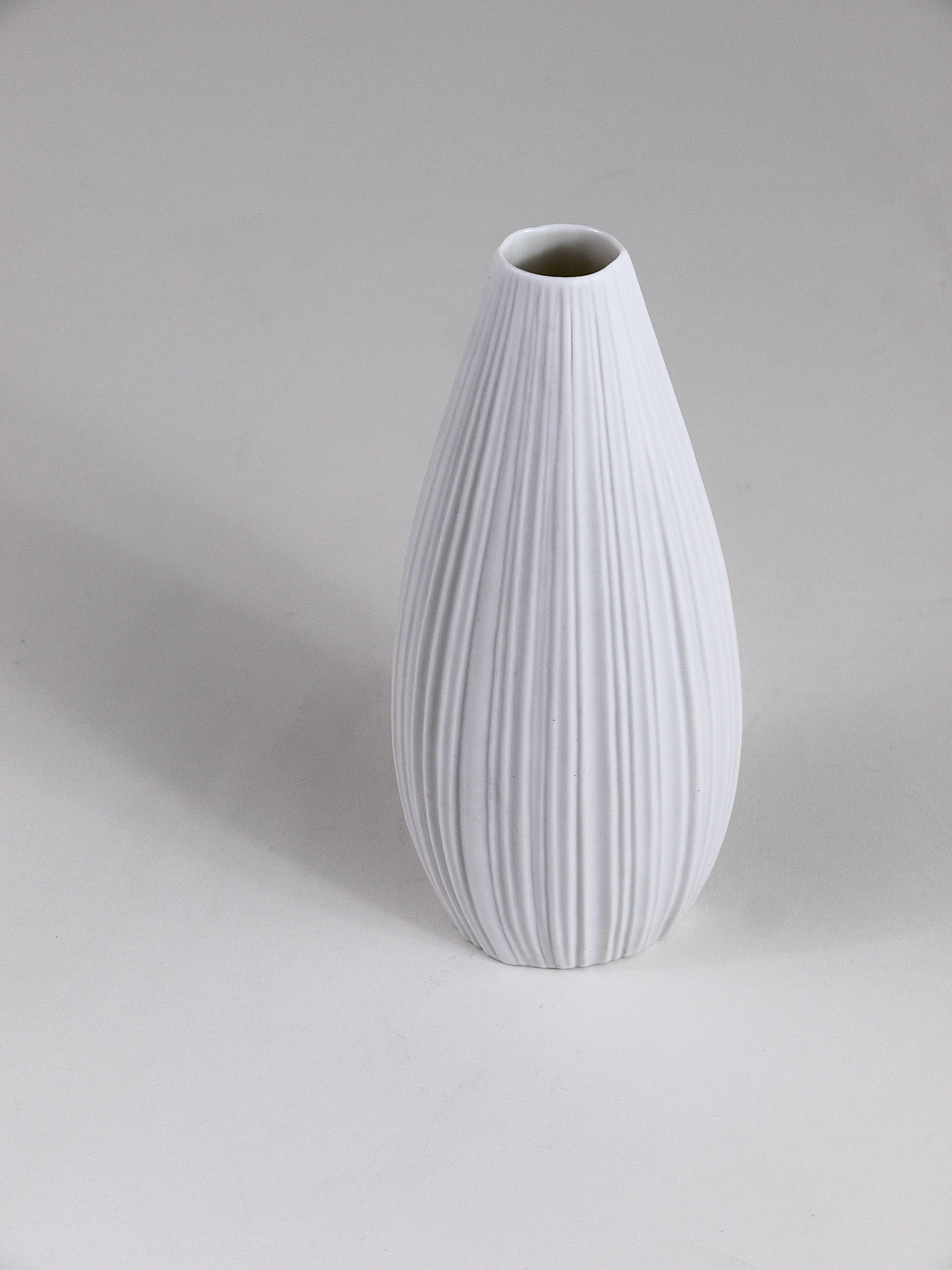 White porcelain vase with striped relief by Rosenthal, designed by Martin Freyer, Germany, 1960s.