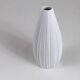 White porcelain vase with striped relief by Rosenthal, designed by Martin Freyer, Germany, 1960s.