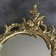 Miroir en bronze doré style rocaille 68 x 42 cm