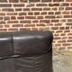 Pair of patinated leather club armchairs