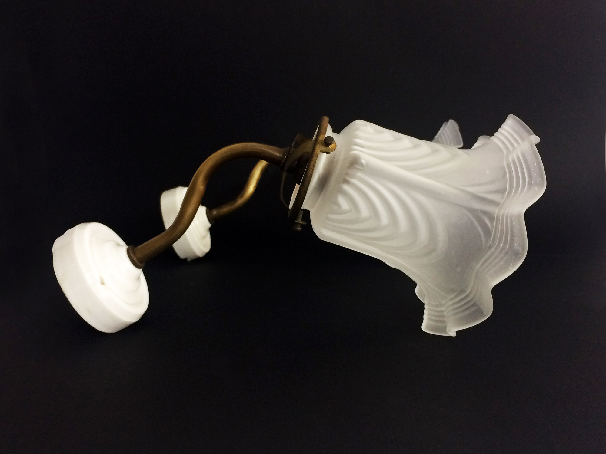 Pair of brass swan collar wall sconces, porcelain fastening. Vintage