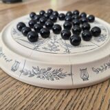 Ceramic solitaire game