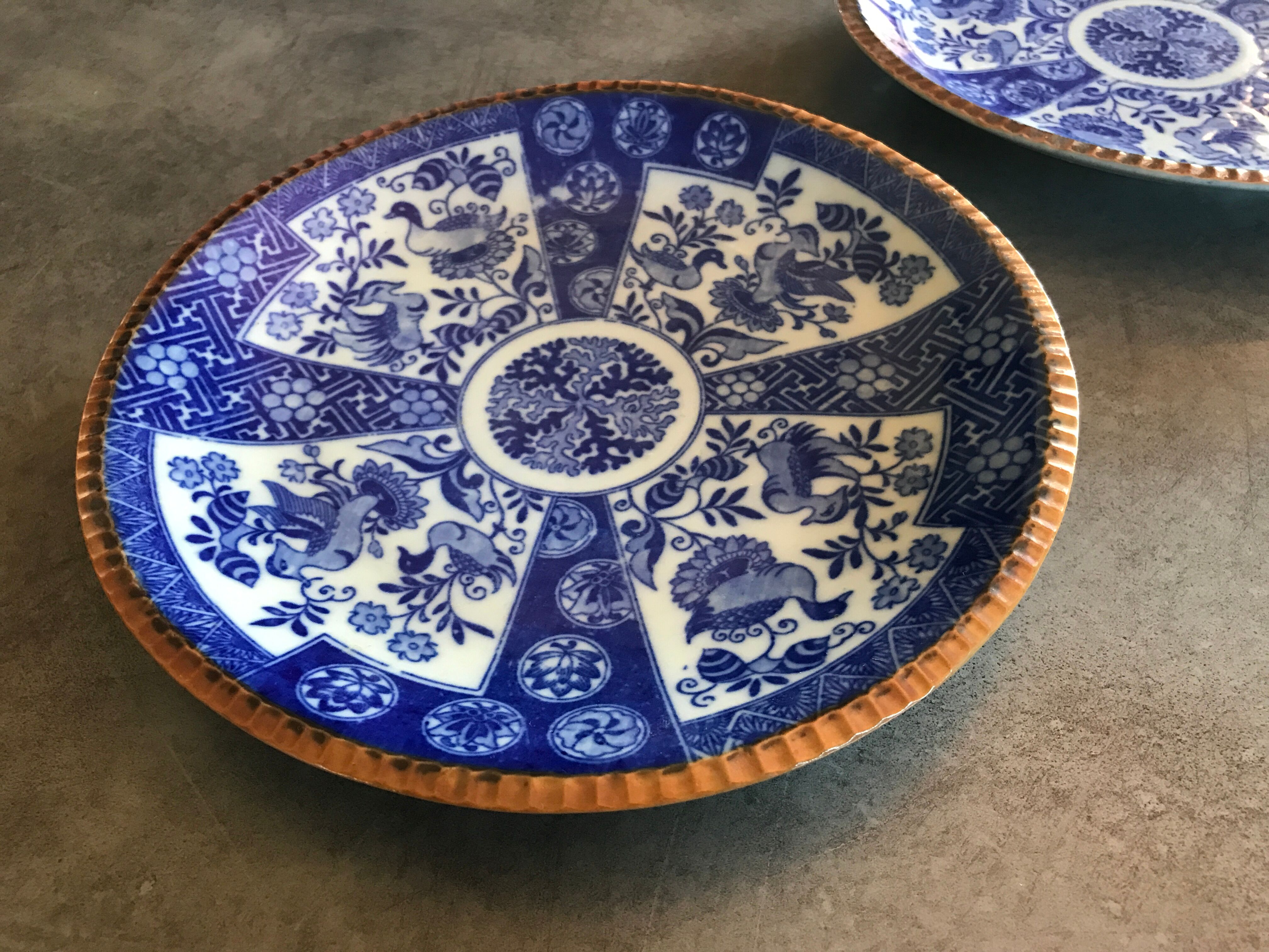 Pair of vintage japanese igezara plates decorated with floral and bird motifs