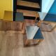 Vintage nesting table in gold metal and smoked mirror glass