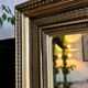Large antique beveled mirror in the Napoleon III style - Gold and black frame