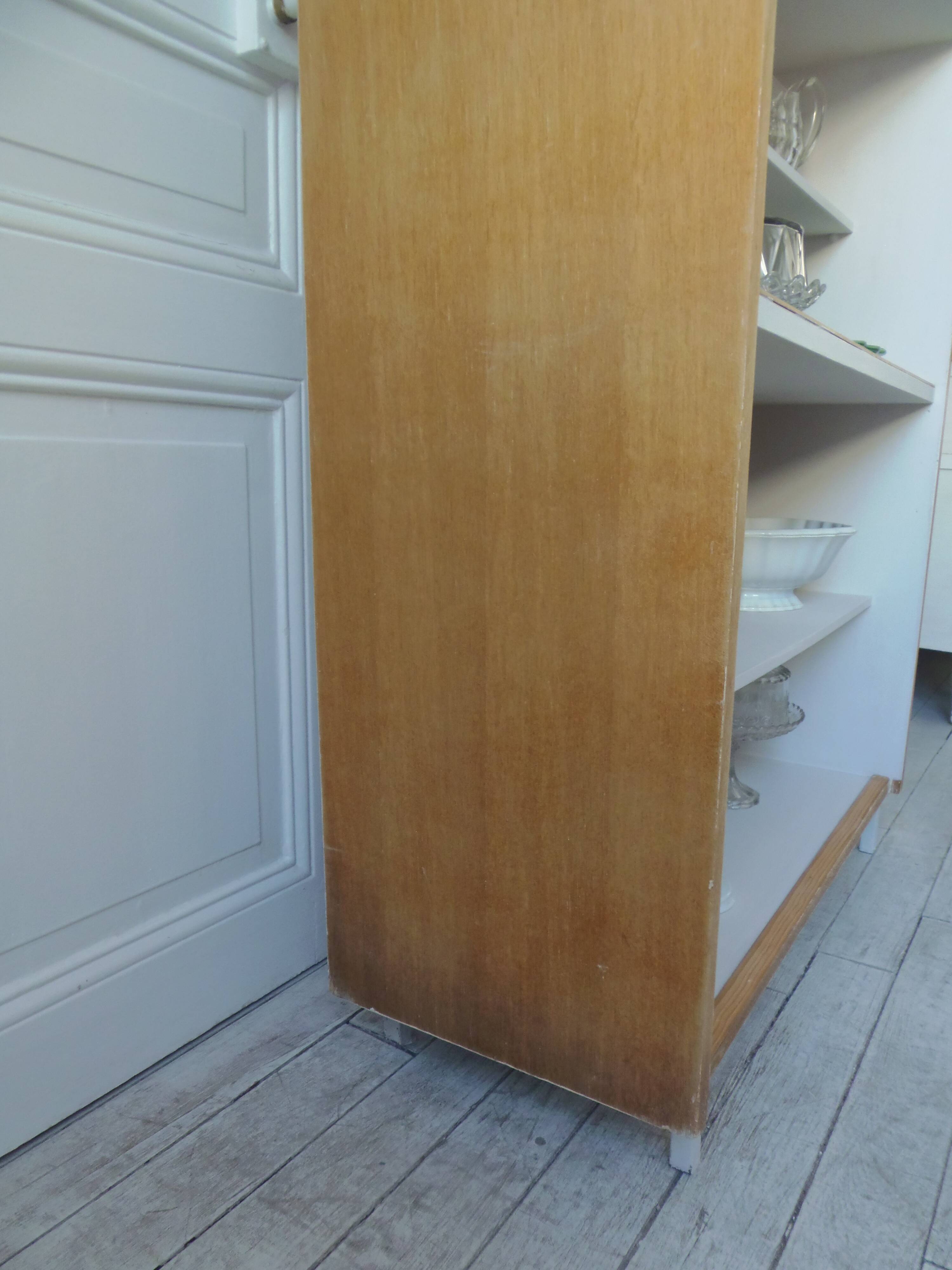Vintage bookshelf in oak veneer, pearl grey interior, metal legs.