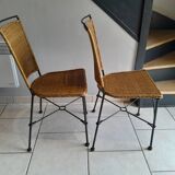 Pair of vintage wrought iron and rattan chairs