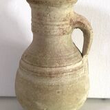 Beige terracotta pitcher