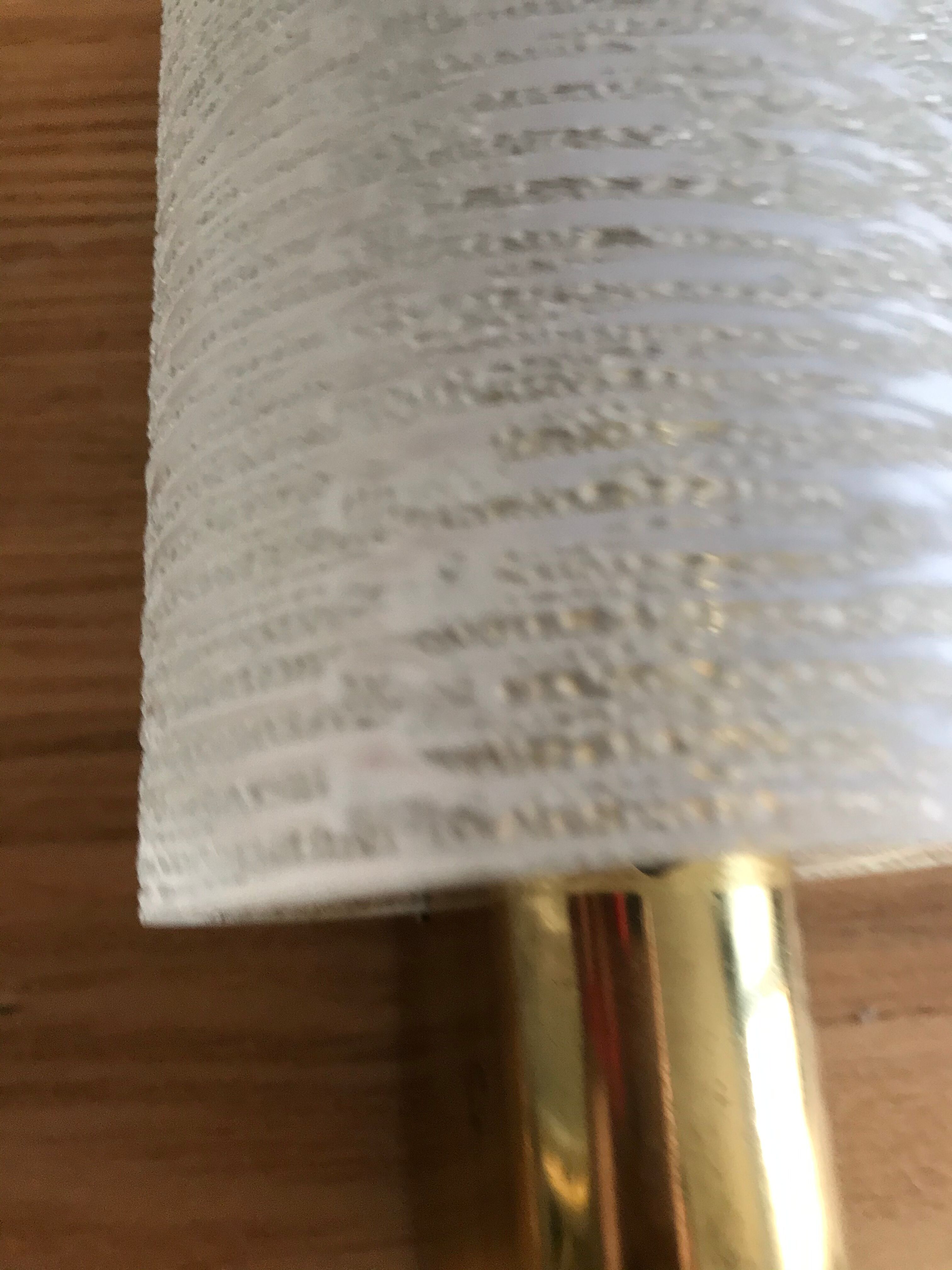 Metal and glass wall light