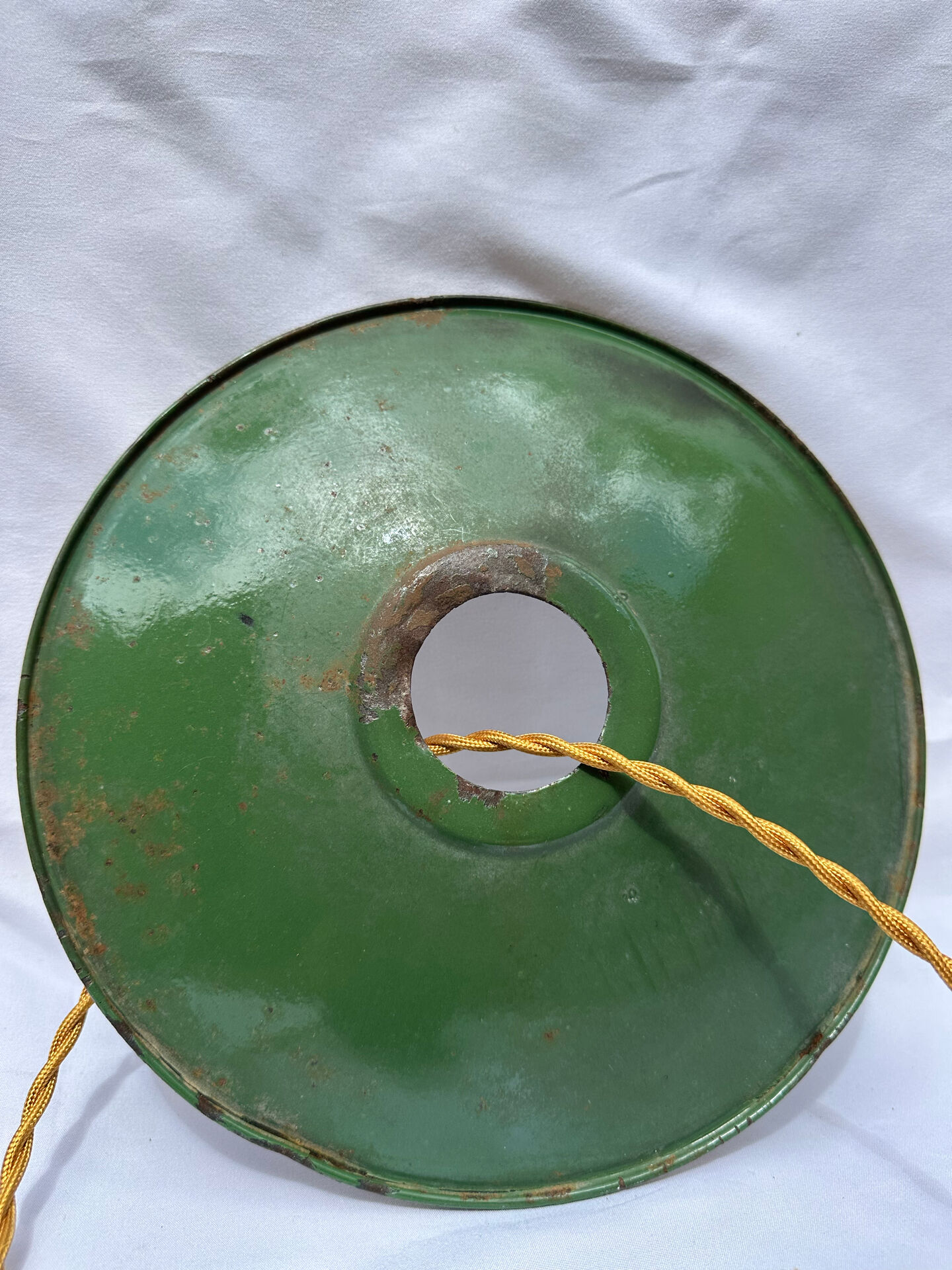 Old green and white enamelled sheet metal suspension