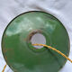 Old green and white enamelled sheet metal suspension