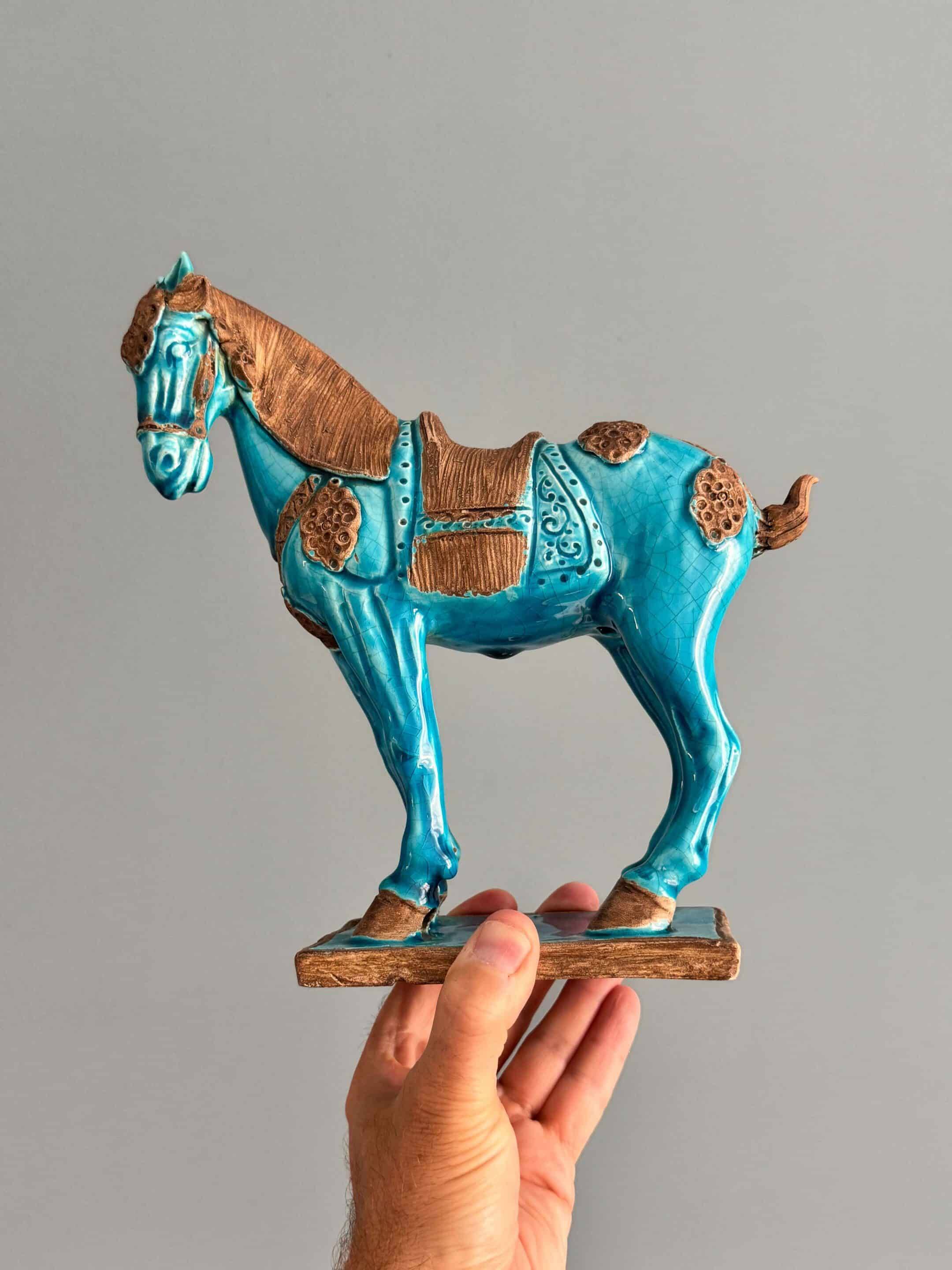 Sculpture of a Tang horse in turquoise blue earthenware